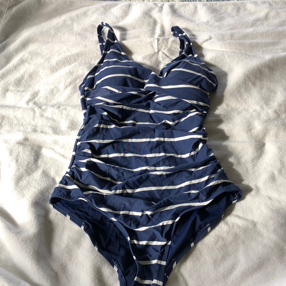 Niptuck bathing suit. Adjustable straps. Only wore once. Size 4.